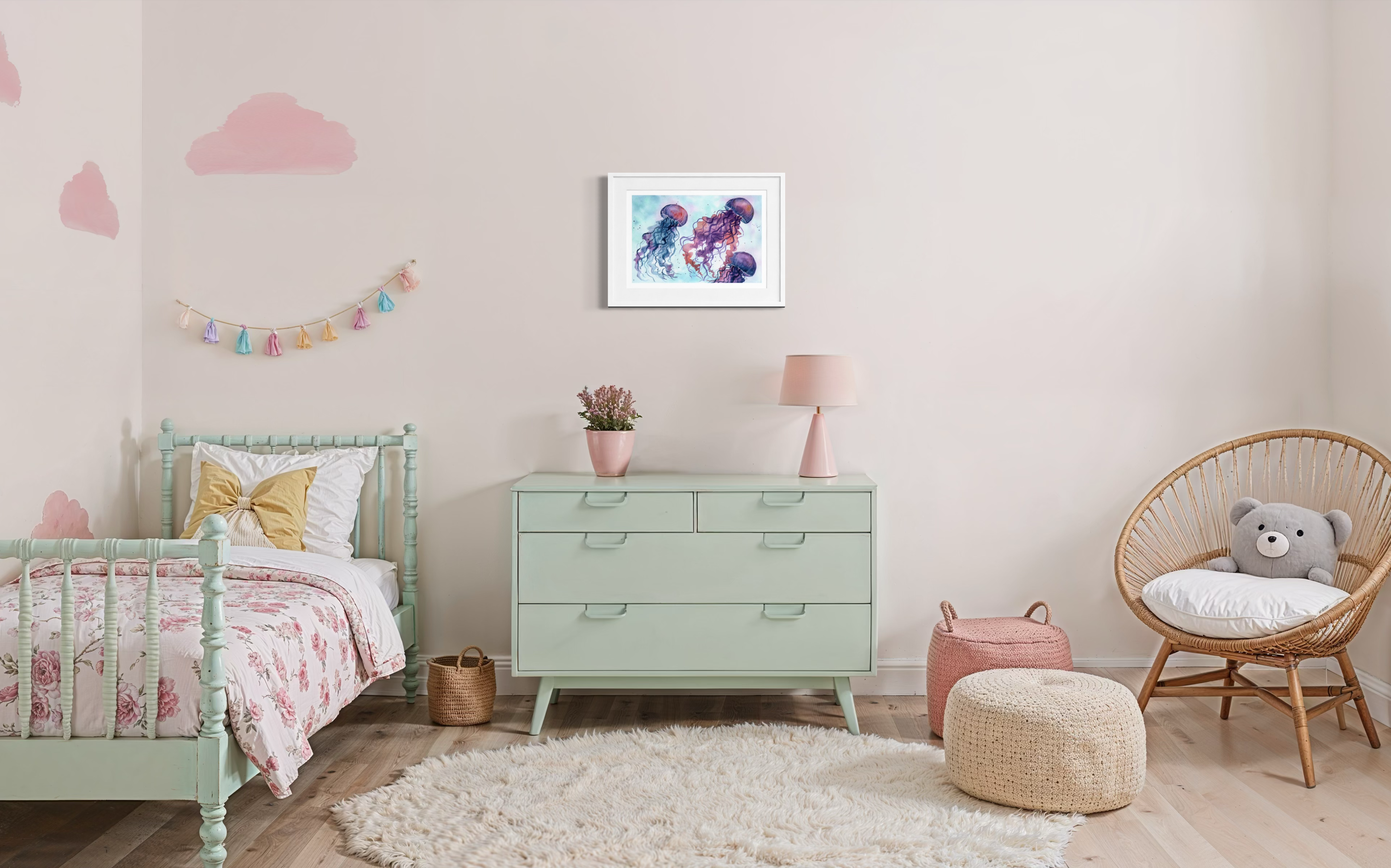 Children's room with a crib, dresser, and chair against a light pink wall.